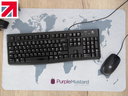 Upgrade your workspace with Purple Mustard's office desk mat